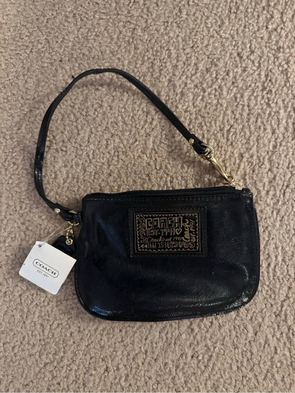 Coach Black Leather Wristlet with Gold Patch